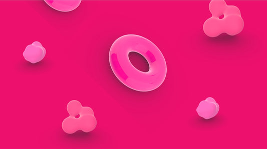 a pink object with a hole in the middle of it