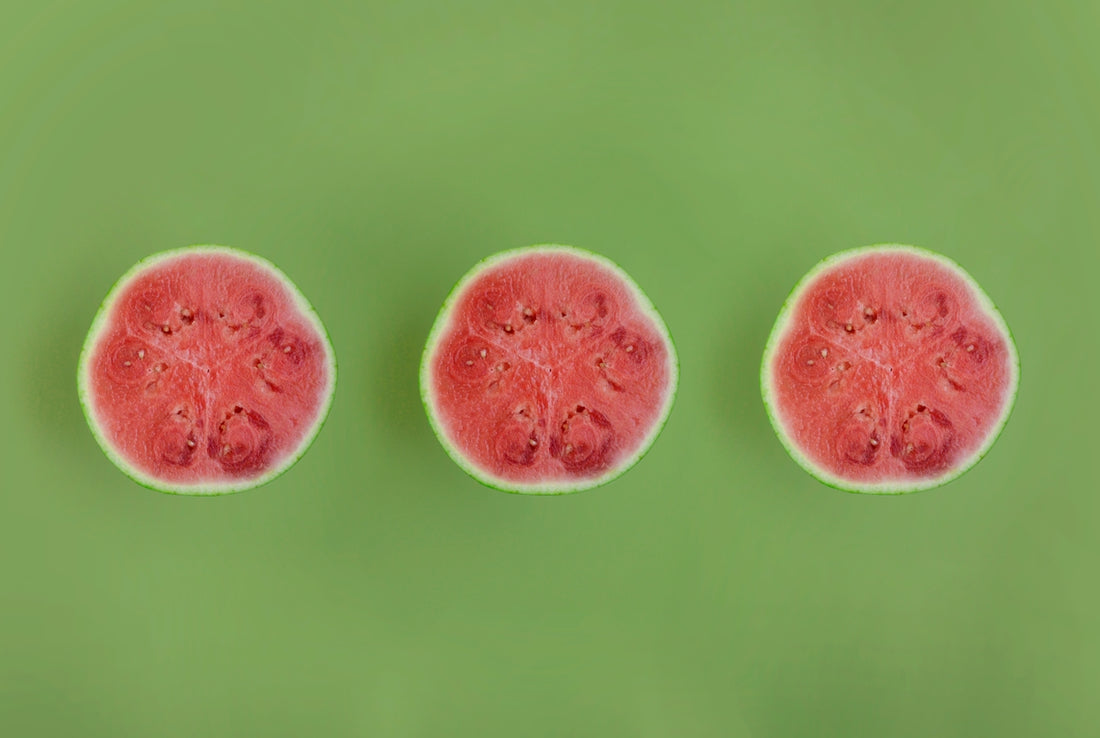 a group of pink and white round objects