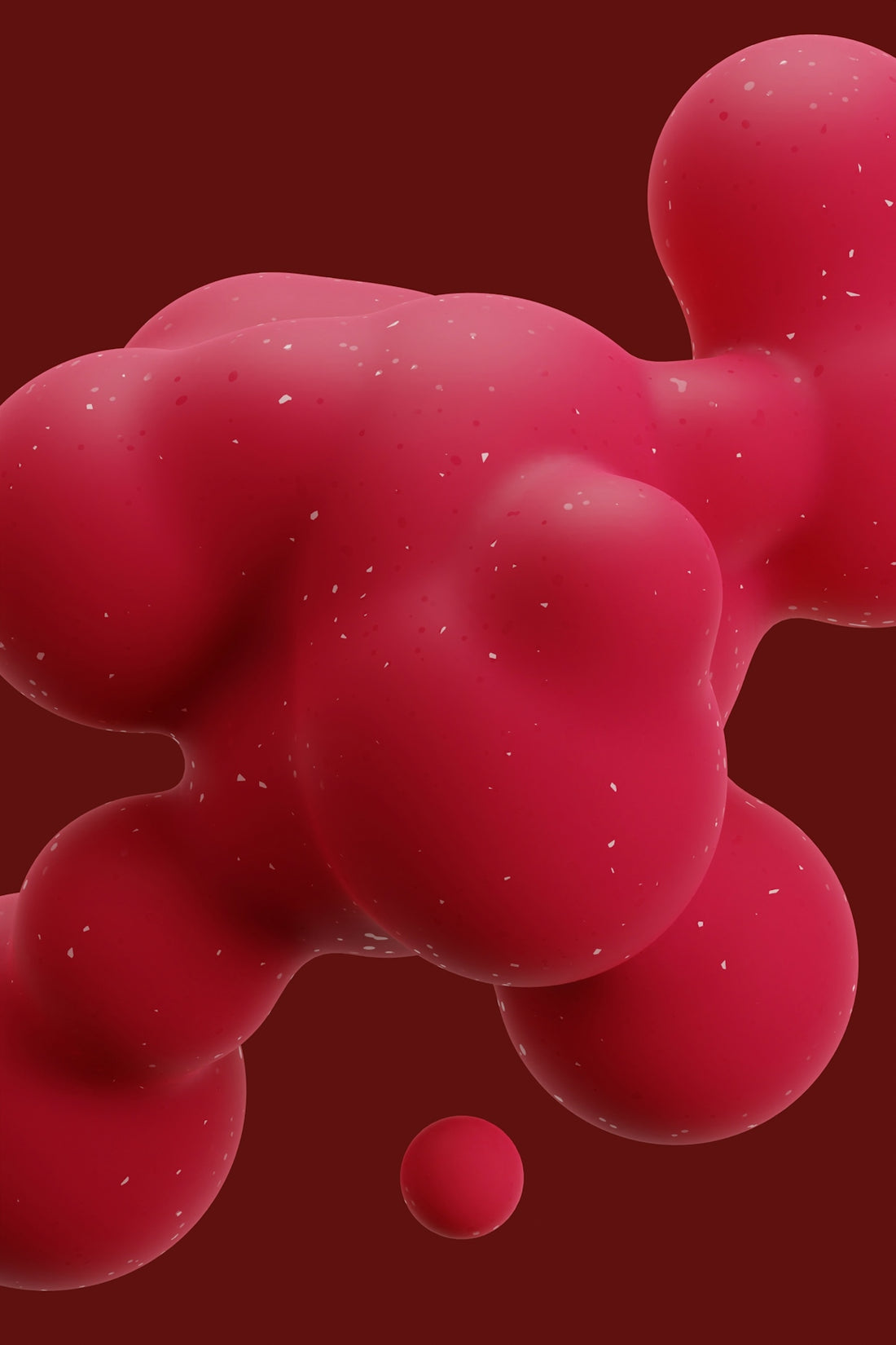 a close up of a red substance on a red background