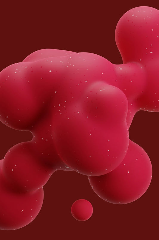 a close up of a red substance on a red background