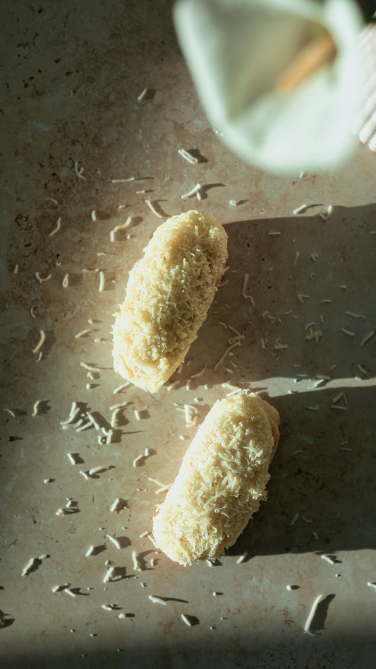 a couple of pieces of food sitting on top of a table