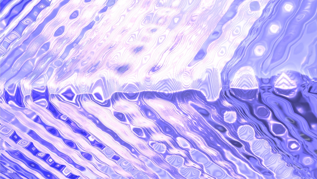 Abstract, wavy, bluish-purple shapes fill the image.